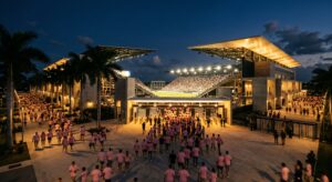 Nu Stadium visitor guide: fans walking to Miami Freedom Park at dusk